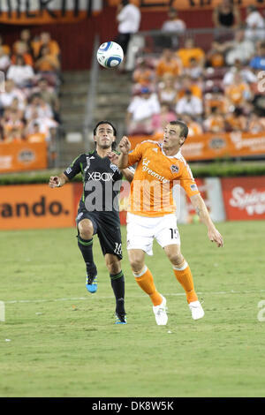 July 30, 2011 - Houston, Texas, U.S - Houston Dynamo Forward Cam Weaver (15)  and Seattle Sounders FC Midfielder Mauro Rosales (10) go up for this ball. Houston Dynamo defeated the Seattle Sounders FC 3-1 at Robertson Stadium in Houston, Texas. (Credit Image: © Luis Leyva/Southcreek Global/ZUMAPRESS.com) Stock Photo