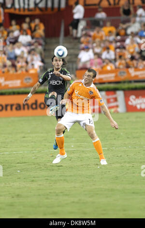 July 30, 2011 - Houston, Texas, U.S - Houston Dynamo Forward Cam Weaver (15)  and Seattle Sounders FC Midfielder Mauro Rosales (10) go up for this ball. Houston Dynamo defeated the Seattle Sounders FC 3-1 at Robertson Stadium in Houston, Texas. (Credit Image: © Luis Leyva/Southcreek Global/ZUMAPRESS.com) Stock Photo