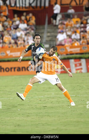 July 30, 2011 - Houston, Texas, U.S - Houston Dynamo Forward Cam Weaver (15)  and Seattle Sounders FC Midfielder Mauro Rosales (10) go up for this ball. Houston Dynamo defeated the Seattle Sounders FC 3-1 at Robertson Stadium in Houston, Texas. (Credit Image: © Luis Leyva/Southcreek Global/ZUMAPRESS.com) Stock Photo