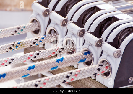 Close-up of stopper with five ropes on a sailboat Stock Photo