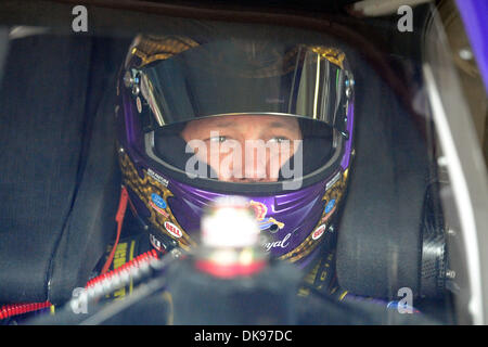 Aug. 12, 2011 - Watkins Glen, New York, U.S - Matt Kenseth, driver of the (17) Crown Royal Ford,  sits behind the wheel moments before the first practice for the Heluva Good! Sour Cream Dips at The Glen in Watkins Glen, NY. (Credit Image: © Michael Johnson/Southcreek Global/ZUMAPRESS.com) Stock Photo