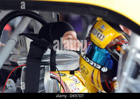 Aug. 12, 2011 - Watkins Glen, New York, U.S - Kyle Busch, driver of the (18) M&M's Toyota, straps himself into his car during practice for the Heluva Good! Sour Cream Dips at The Glen in Watkins Glen, NY. (Credit Image: © Michael Johnson/Southcreek Global/ZUMAPRESS.com) Stock Photo