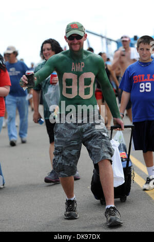 Aug. 12, 2011 - Watkins Glen, New York, U.S - A Dale Earnhardt Jr. fan walks through the infield sporting the Jr. Nation colors during practice for the Heluva Good! Sour Cream Dips at The Glen in Watkins Glen, NY. (Credit Image: © Michael Johnson/Southcreek Global/ZUMAPRESS.com) Stock Photo