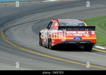 Aug. 12, 2011 - Watkins Glen, New York, U.S - Carl Edwards, driver of the (99) Scotts Ortho Ford, rolls through turn 11 during practice for the Heluva Good! Sour Cream Dips at The Glen in Watkins Glen, NY. (Credit Image: © Michael Johnson/Southcreek Global/ZUMAPRESS.com) Stock Photo