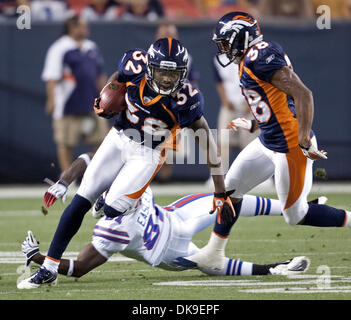 Denver Broncos' Perrish Cox (32) against Arizona Cardinals' Trumaine McBride  (23) and Jay Feeley (4) during an NFL football game Sunday, Dec. 12, 2010,  in Glendale, Ariz. (AP Photo/Paul Connors Stock Photo - Alamy