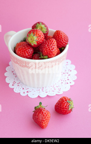 Strawberries in a paper cup Stock Photo - Alamy
