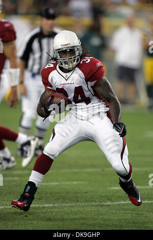 Arizona Cardinals running back Ryan Williams (34) breaks the tackle of ...