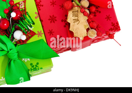 Christmas presents in red and green colors over white Stock Photo