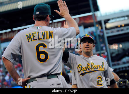 Sept. 10, 2011 - Arlington, Texas, USA - September 10, 2011. Arlington, Texas, USA. Oakland Athletics manager BOB MELVIN congratulates CHAD PENNINGTON as the Oakland Athletics defeated the Texas Rangers 8 to 7 at Rangers Ballpark in Arlington, Texas. (Credit Image: © Ralph Lauer/ZUMAPRESS.com) Stock Photo