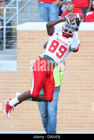 Sept. 10, 2011 - Austin, Texas, United States of America - Houston Cougars wide receiver Isaiah Sweeney (89) leaps high into the air for a touchdown during the game between North Texas Mean Green and the Houston Cougars at Apogee Stadium in Denton, Texas. (Credit Image: © Matt Pearce/Southcreek Global/ZUMAPRESS.com) Stock Photo