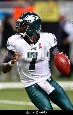 Michael Vick runs Eagles past Rams, 31-13