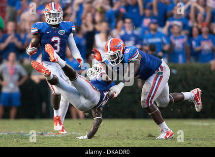 Sept. 17, 2011 - FL, USA - WILL VRAGOVIC   |   Times.ht 343251 vrag UF 15 of  (09/17/11 Gainesville) Florida Gators defensive tackle Dominique Easley (2) brings down Florida Gators safety Matt Elam (22) after Elam picked off a pass during the fourth quarter of the University of Florida Gators against the Tennessee Volunteers football game at Ben Hill Griffin Stadium in Gainesville  Stock Photo