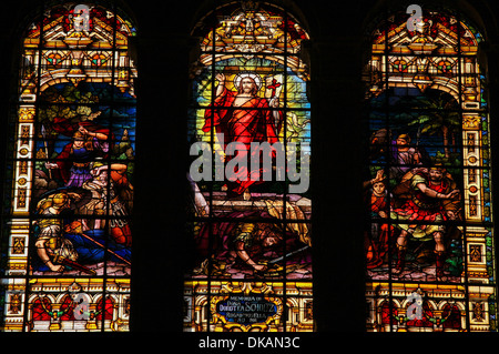 Stained glass window depicting Jesus rising from the grave, located in the cathedral of Malaga, Spain Stock Photo