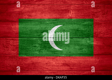 flag of the Maldives or banner on wooden background Stock Photo