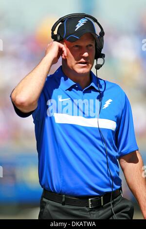 Sept. 24, 2011 - Colorado Springs, Colorado, U.S - Air Force Falcons head coach Troy Calhoun on the radio during the first quarter. Air Force hosted Tennessee State at Falcon Stadium in Colorado Springs, CO. (Credit Image: © Isaiah Downing/Southcreek Global/ZUMApress.com) Stock Photo