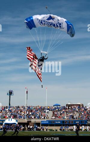 Sept. 24, 2011 - Colorado Springs, Colorado, U.S - A parachuter comes into the stadium with the American flag before the start of the game against the Tennessee State Tigers. Air Force hosted Tennessee State at Falcon Stadium in Colorado Springs, CO. (Credit Image: © Isaiah Downing/Southcreek Global/ZUMApress.com) Stock Photo