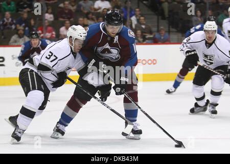 Sept. 28, 2011 - Denver, Colorado, U.S - Colorado Avalanche center Jay McClement (16) moves the puck passed Los Angeles Kings defenseman Thomas Hickey (37) during the second period. The Colorado Avalanche hosted the Los Angeles Kings at the Pepsi Center in Denver, CO. (Credit Image: © Isaiah Downing/Southcreek Global/ZUMApress.com) Stock Photo