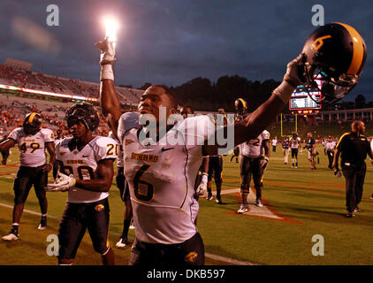 Sep. 24, 2011 - Charlottesville, Virginia, U.S. - Southern Miss Golden Eagles players celebrate the 30-24 win over the Virginia Cavaliers during the game at Scott Stadium. (Credit Image: © Andrew Shurtleff/ZUMAPRESS.com) Stock Photo