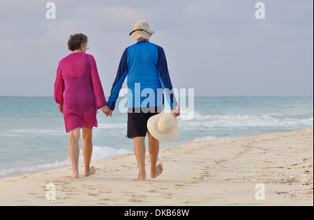 A retired couple on a beach, Yucatan Peninsula, Quintana Roo, Mexico Stock Photo