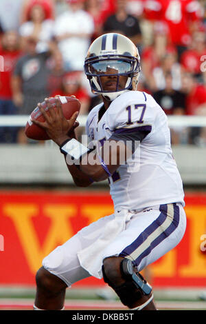 Oct. 1, 2011 - Salt Lake City, Utah, U.S - University of Washington quarterback Keith Price (17) dodges the Utah defense in the first half in Rice-Eccles Stadium in Salt Lake City, Utah. (Credit Image: © Stephen Holt/Southcreek/ZUMAPRESS.com) Stock Photo