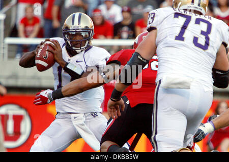 Oct. 1, 2011 - Salt Lake City, Utah, U.S - University of Washington quarterback Keith Price (17) dodges the Utah defense in the first half in Rice-Eccles Stadium in Salt Lake City, Utah. (Credit Image: © Stephen Holt/Southcreek/ZUMAPRESS.com) Stock Photo