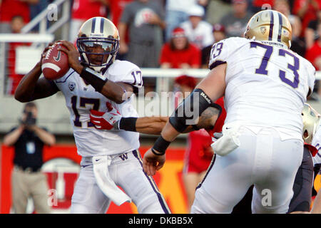 Oct. 1, 2011 - Salt Lake City, Utah, U.S - University of Washington quarterback Keith Price (17) dodges the Utah defense in the first half in Rice-Eccles Stadium in Salt Lake City, Utah. (Credit Image: © Stephen Holt/Southcreek/ZUMAPRESS.com) Stock Photo