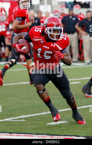 Oct. 1, 2011 - Salt Lake City, Utah, U.S - The University of Utah running back John White (15) looks for an opening in the University of Washington defense in Rice-Eccles Stadium in Salt Lake City, Utah. (Credit Image: © Stephen Holt/Southcreek/ZUMAPRESS.com) Stock Photo