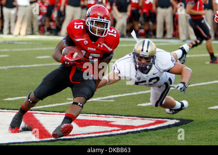 Oct. 1, 2011 - Salt Lake City, Utah, U.S - The University of Utah running back John White (15) looks for an opening in the University of Washington defense in Rice-Eccles Stadium in Salt Lake City, Utah. (Credit Image: © Stephen Holt/Southcreek/ZUMAPRESS.com) Stock Photo