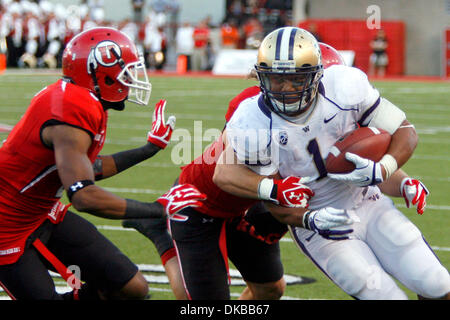 Oct. 1, 2011 - Salt Lake City, Utah, U.S - University of Washington tailback Chris Polk (1) is downed by the Utah defensive line in the first half in Rice-Eccles Stadium in Salt Lake City, Utah. (Credit Image: © Stephen Holt/Southcreek/ZUMAPRESS.com) Stock Photo