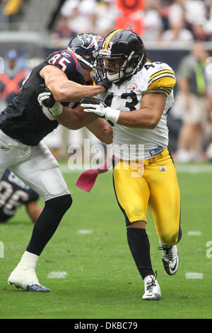 Oct. 2, 2011 - Houston, Texas, U.S - Pittsburgh Steelers safety Troy Polamalu gets shoved by Houston Texans tight end Joel Dreessen(85). Houston Texans beat the Pittsburgh Steelers 17-10 at Reliant Stadium in Houston Texas. (Credit Image: © Luis Leyva/Southcreek/ZUMAPRESS.com) Stock Photo