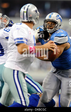 Oct. 2, 2011 - Arlington, Texas, United States of America - Detroit Lions defensive tackle Ndamukong Suh (90) fights Dallas Cowboys guard Kyle Kosier (63) trying to get to Dallas Cowboys quarterback Tony Romo (9) during second half game action as the Detroit Lions face-off against the Dallas Cowboys at Cowboys Stadium in Arlington, Texas.  The Detroit Lions come back in the second  Stock Photo
