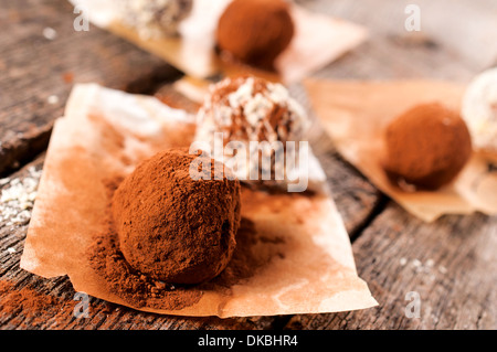 Tasty and homemade dark chocolate pralines.Selective focus on the front praline Stock Photo