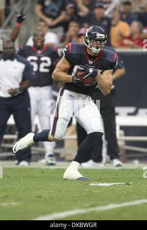 Oct. 9, 2011 - Houston, Texas, U.S - Houston Texans tight end Joel Dreessen(85) makes this catch for a touchdown. Houston Texans lost to the Oakland Raiders 25-20 at Reliant Stadium in Houston Texas. (Credit Image: © Luis Leyva/Southcreek/ZUMAPRESS.com) Stock Photo