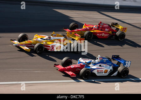 Oct. 16, 2011 - Las Vegas, Nevada, U.S - Ryan Hunter-Reay, driver of the #28 Team DHL / Circle K / Sun Drop Citrus Soda Honda, leads the pack out of turn 1 during the exciting IndyCar racing action at the IZOD IndyCar World Championships at Las Vegas Motor Speedway in Las Vegas, Nevada. (Credit Image: © Matt Gdowski/Southcreek/ZUMAPRESS.com) Stock Photo