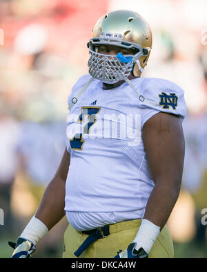 Palo Alto, CA, . 30th Nov, 2013. Notre Dame Fighting Irish defensive lineman Stephon Tuitt (7) warms up prior to the NCAA Football game between the Stanford Cardinal and the Notre Dame Fighting Irish at Stanford Stadium in Palo Alto, CA. Stanford defeated Notre Dame 27-20. Damon Tarver/Cal Sport Media/Alamy Live News Stock Photo