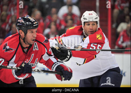 Oct. 18, 2011 - Washington Dc, District of Columbia, United States of America - Verizon Center NHL game action. Florida Panthers defenseman Ed Jovanovski (55) checking Washington Capitals right wing Mike Knuble (22), Final score; Capitals 3 Panthers 0 (Credit Image: © Roland Pintilie/Southcreek/ZUMAPRESS.com) Stock Photo