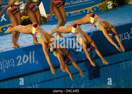Oct. 19, 2011 - Guadalajara, Mexico - Brazil's synchronized swimmers dive in the pool to begin their round in the team technical routine preliminary at the 2011 Pan American Games in Guadalajara, Mexico. (Credit Image: © Jeremy Breningstall/ZUMAPRESS.com) Stock Photo