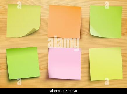 Vector collection of post it notes in several colors on the wooden plate for your own text or image Stock Vector