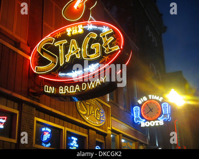 Neon signs outside Honky Tonk bars on Broadway in downtown Nashville Tennessee. Stock Photo