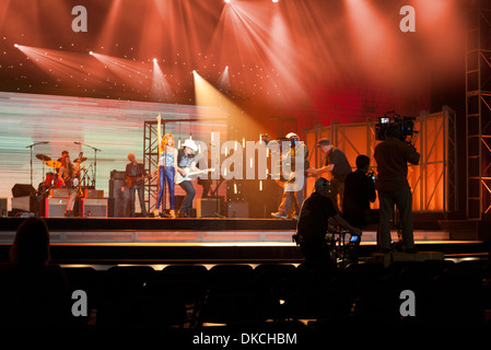 Film crews shoot footage during a musical performance on the set of the US TV show called Nashville and filmed in Nashville, TN Stock Photo