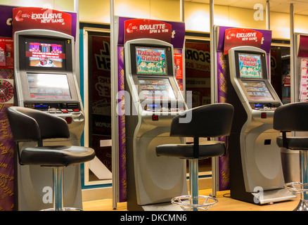 Fixed odds betting terminals (FOBT fixed odds betting terminal) in Ladbrokes Betting office. England. UK Stock Photo