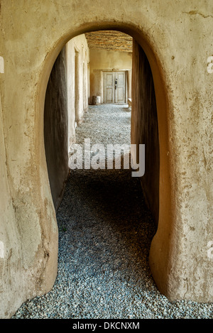 Arched walkway at Hacienda de los Martinez museum, Taos, New Mexico Stock Photo