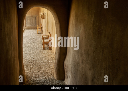 Arched walkway at Hacienda de los Martinez museum, Taos, New Mexico Stock Photo