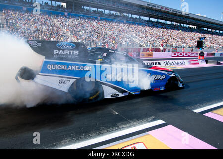 Oct. 29, 2011 - Las Vegas, Nevada, U.S - NHRA Funny Car driver Robert Tasca III of the Motorcraft / Quick Lane Ford Mustang finishes his burnout during qualifying sessions at the 11th Annual Big O Tires NHRA Nationals at The Strip at Las Vegas Motor Speedway in Las Vegas, Nevada. (Credit Image: © Matt Gdowski/Southcreek/ZUMAPRESS.com) Stock Photo