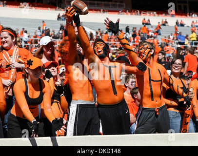 Oct. 29, 2011 - Stillwater, Oklahoma, United States of America - Oklahoma State Cowboys fans in action during the game between the Baylor Bears and the Oklahoma State Cowboys at the Boone Pickens Stadium in Stillwater, OK. Oklahoma State defeats Baylor 59 to 24. (Credit Image: © Dan Wozniak/Southcreek/ZUMAPRESS.com) Stock Photo