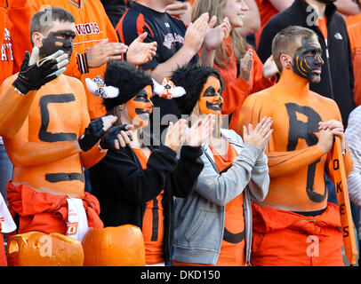 Oct. 29, 2011 - Stillwater, Oklahoma, United States of America - Oklahoma State Cowboys fans in action during the game between the Baylor Bears and the Oklahoma State Cowboys at the Boone Pickens Stadium in Stillwater, OK. Oklahoma State defeats Baylor 59 to 24. (Credit Image: © Dan Wozniak/Southcreek/ZUMAPRESS.com) Stock Photo