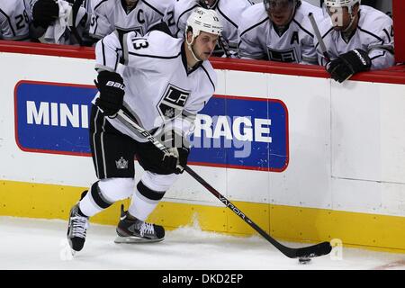 Oct. 30, 2011 - Denver, Colorado, U.S - Los Angeles Kings left wing Kyle Clifford (13) moves the puck in the third period. The Avalanche won 3-2. The Colorado Avalanche hosted the L.A. Kings at the Pepsi Center in Denver, CO. (Credit Image: © Isaiah Downing/Southcreek/ZUMApress.com) Stock Photo