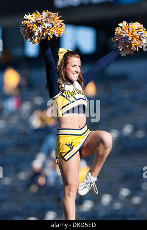 West Virginia Mountaineers cheerleader during the NCAA college football ...