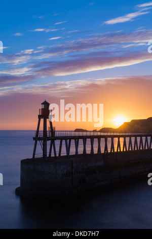 The East Pier at Whitby at sunrise. Stock Photo