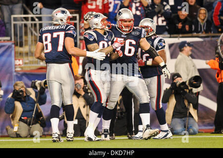 From left New England Patriots wide receiver Julian Edelman (11),  quarterback Tom Brady (12) and offensive coordinator Josh McDaniels sit on  the bench before the start of Super Bowl LIII between the